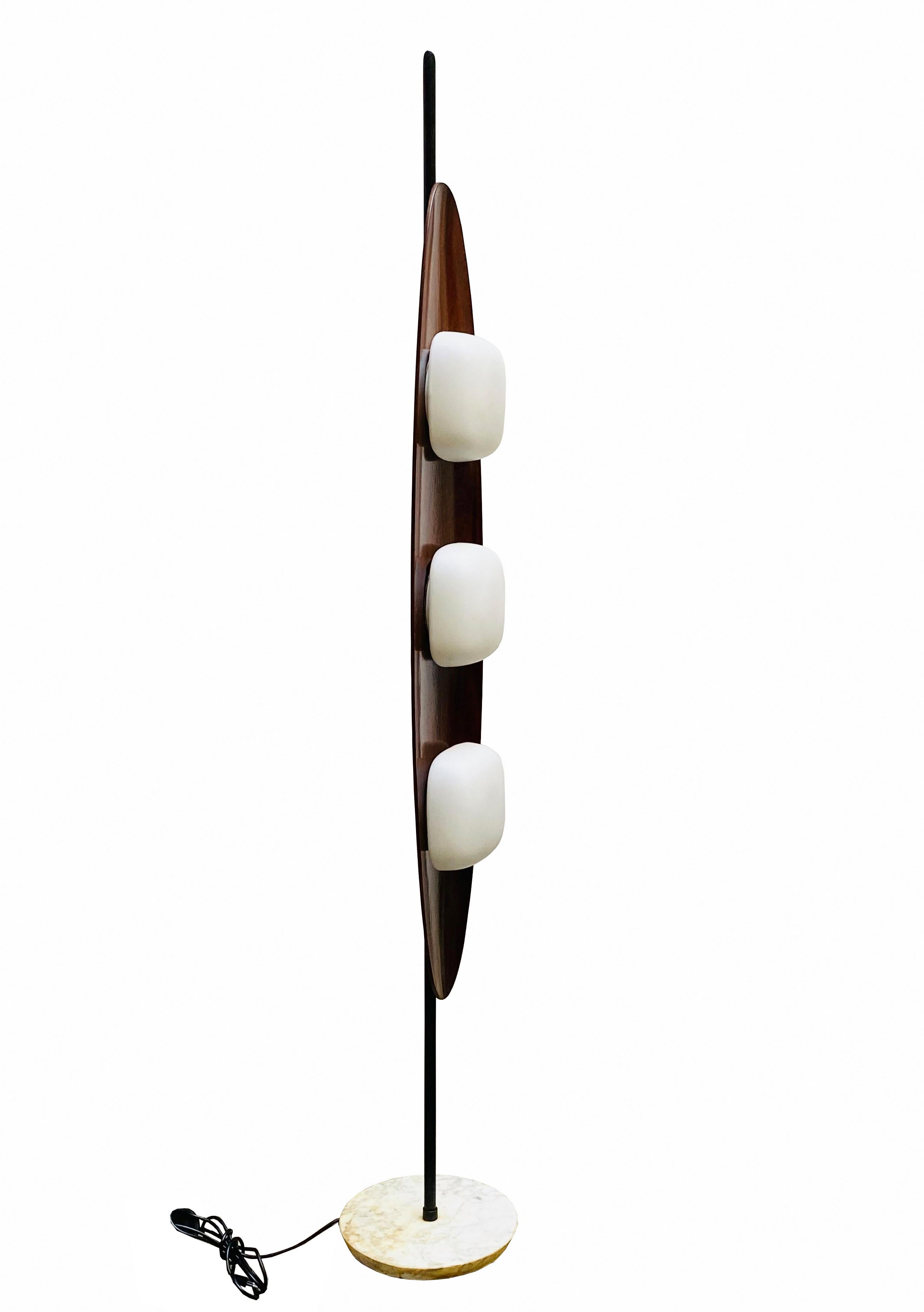 Iconic floor lamp mod. Surf by Italian designer Gioffredo Reggiani in the 1960s
Marble base, black lacquered metal stem, teak surf and 3 opaline glass diffusers