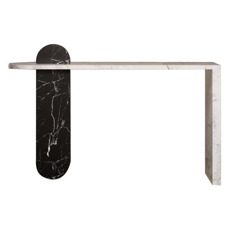 Gol. 002 marble table by Chapter Studio
Dimensions: H 86 x W 40 x D 160
Material: marble (bianco carrara, black marquina)

Effortless composition and eccentric design bring forth the Golestan Series. Evoking rich emotions of heritage and culture