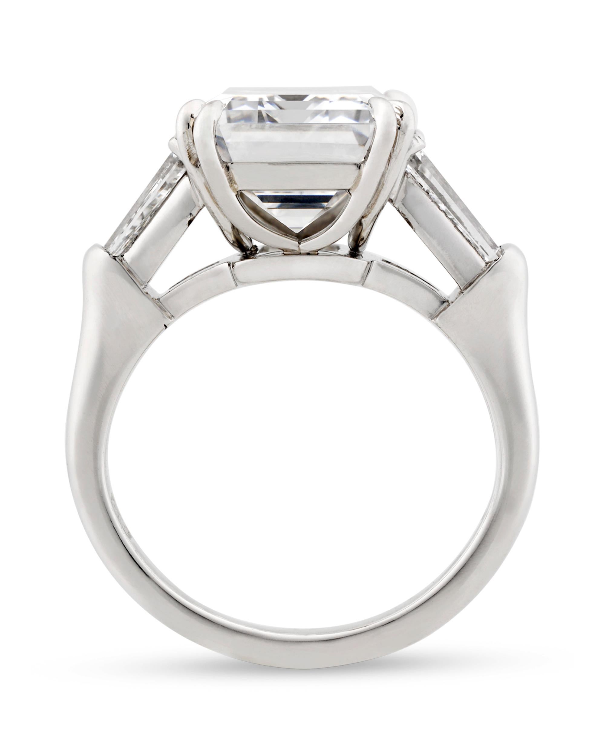 This classic Harry Winston ring is set with an exceptional 5.56-carat emerald-cut diamond that bears all the hallmarks of the legendary Golconda diamonds. The rare stone is certified by the Gemological Institute of America (GIA) as being D color and