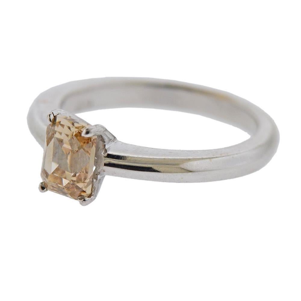 18k gold engagement ring with fancy diamond approx. 1.06ct (measures approx. 6 x 4.95 x 3.5mm) . Measures - size 6 1/2, ring top is 6.5mm and band - 2.3mm wide. Weight 4.6 grams. Marked 750 star mark 1017AL.