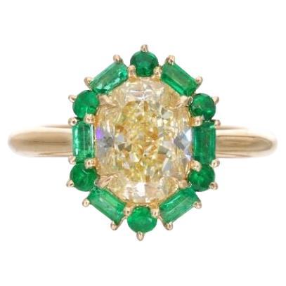 GIA Certified 2.02ct Oval Fancy Light Yellow Diamond and Emerald Engagement Ring For Sale
