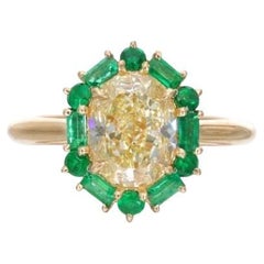 GIA Certified 2.02ct Oval Fancy Light Yellow Diamond and Emerald Engagement Ring