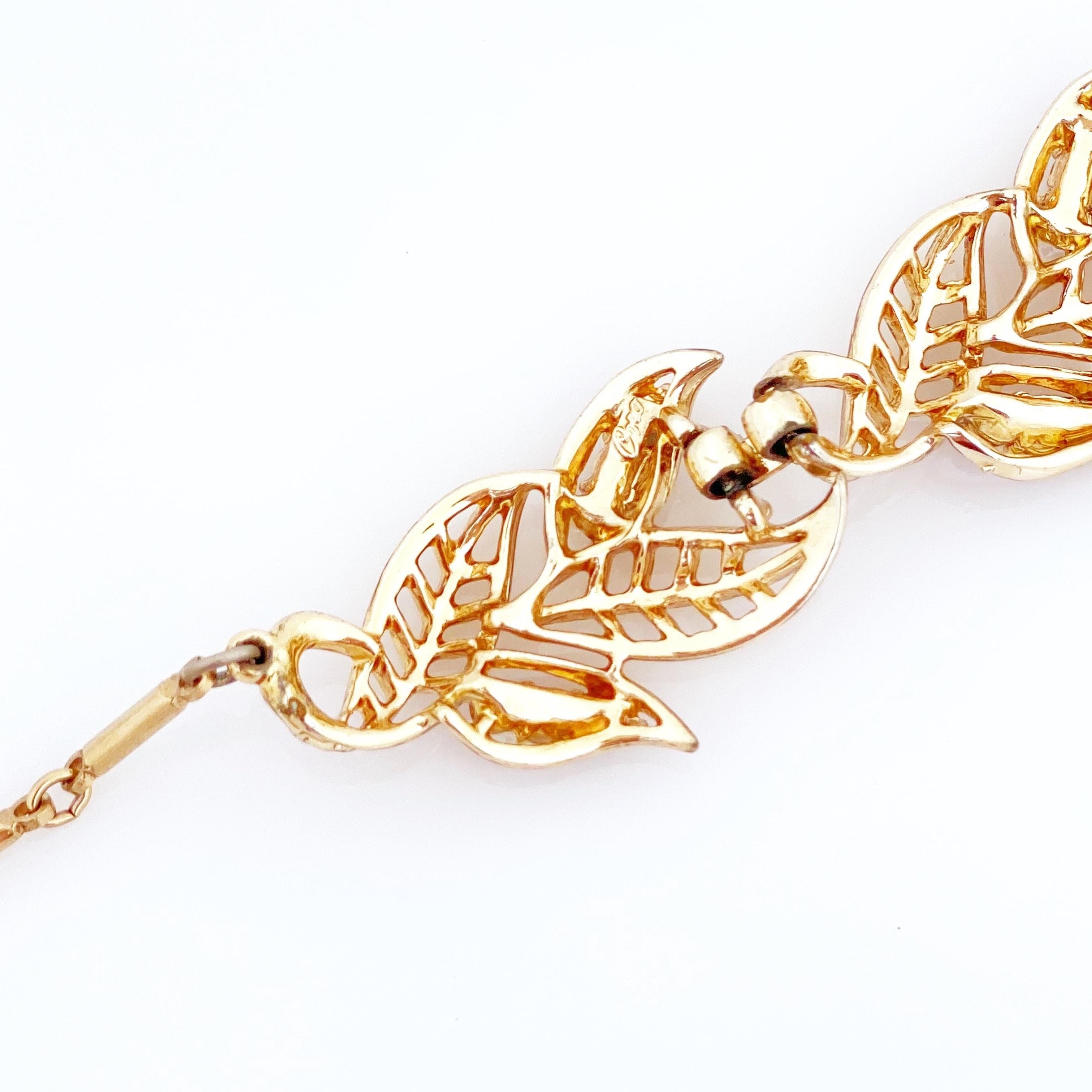 Choker-Halskette aus Gold mit abstraktem Blattmotiv und roten Strasssteinen von Coro, 1950er Jahre im Zustand „Gut“ im Angebot in McKinney, TX