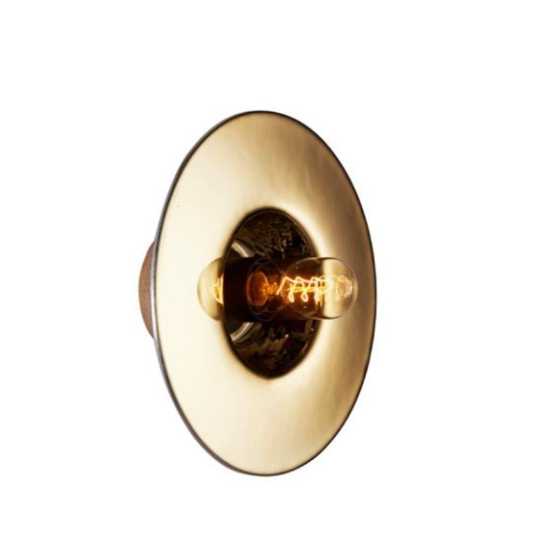 Gold Alvéole wall light by RADAR
Design: Bastien Taillard
Materials: Thermoformed glass, metal.
Dimensions: Depth 15 x Diameter 27 cm.

Also available: In silver or bronze.

All our lamps can be wired according to each country. If sold to the