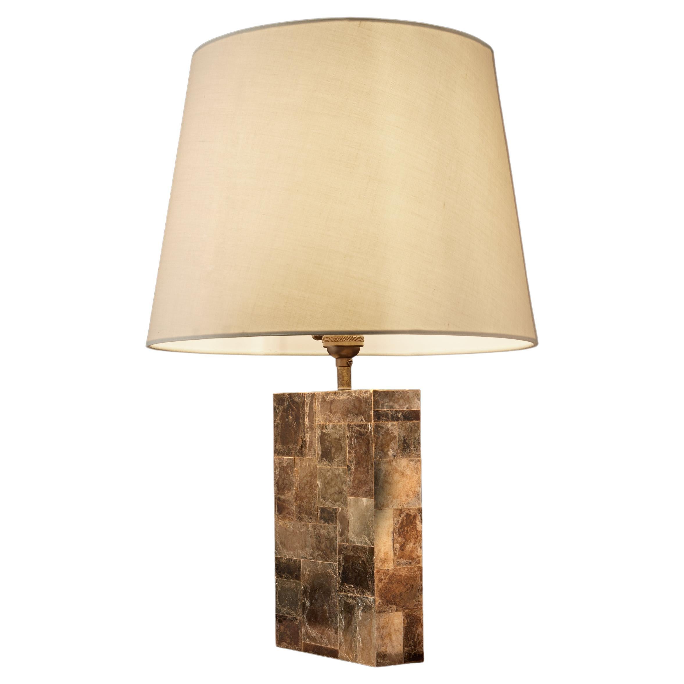 Lovely handmade mica and patinated brass table lamp. The mica glistens and shimmers under the soft glow of the lamp. The standard version of this lamp uses amber mica, but white or black mica can also be used. Mica is a naturally occurring stone