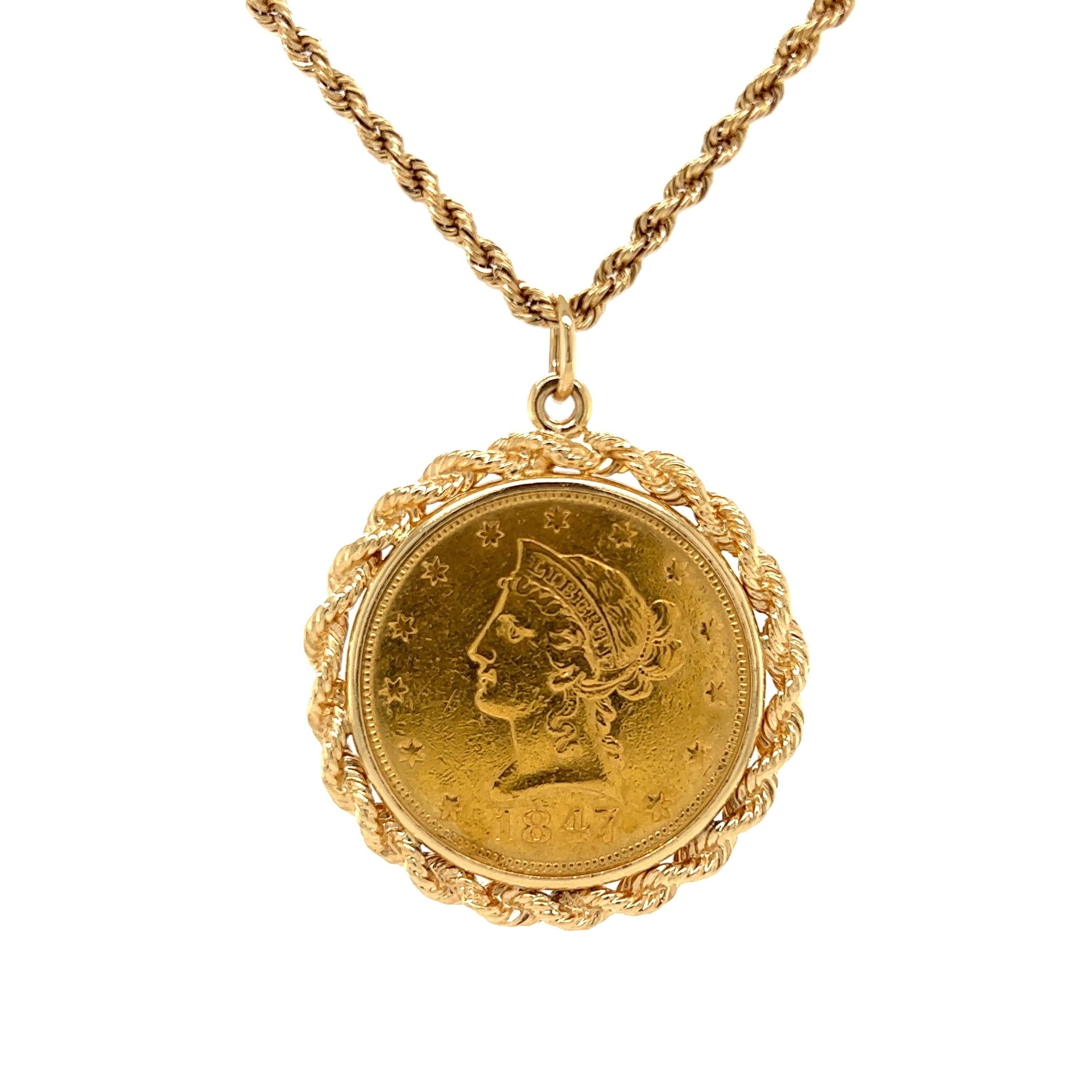 Simply Beautiful! Gold Coin Necklace. Hand set with American Liberty Head 10 Dollar Gold Coin, c1847. Hand crafted 14 Karat Yellow Gold mounting, suspended from an 18” long Gold Rope Chain. Approx. Dimensions:  1.48