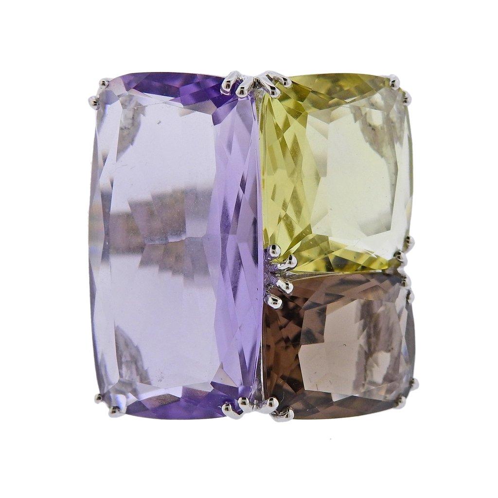 18k white gold modern cocktail ring, set with 7.29ct lemon citrine , 14.45ct amethyst and 4.62ct quartz. Ring size - 7, ring top - 25mm x 23mm. Weight is 13.7 grams. Marked  k18WG,  14 45, 7 29, 4 62,.