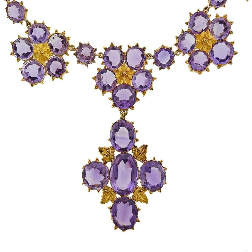 14k yellow gold necklace with amethyst gemstones. Necklace is 14.25