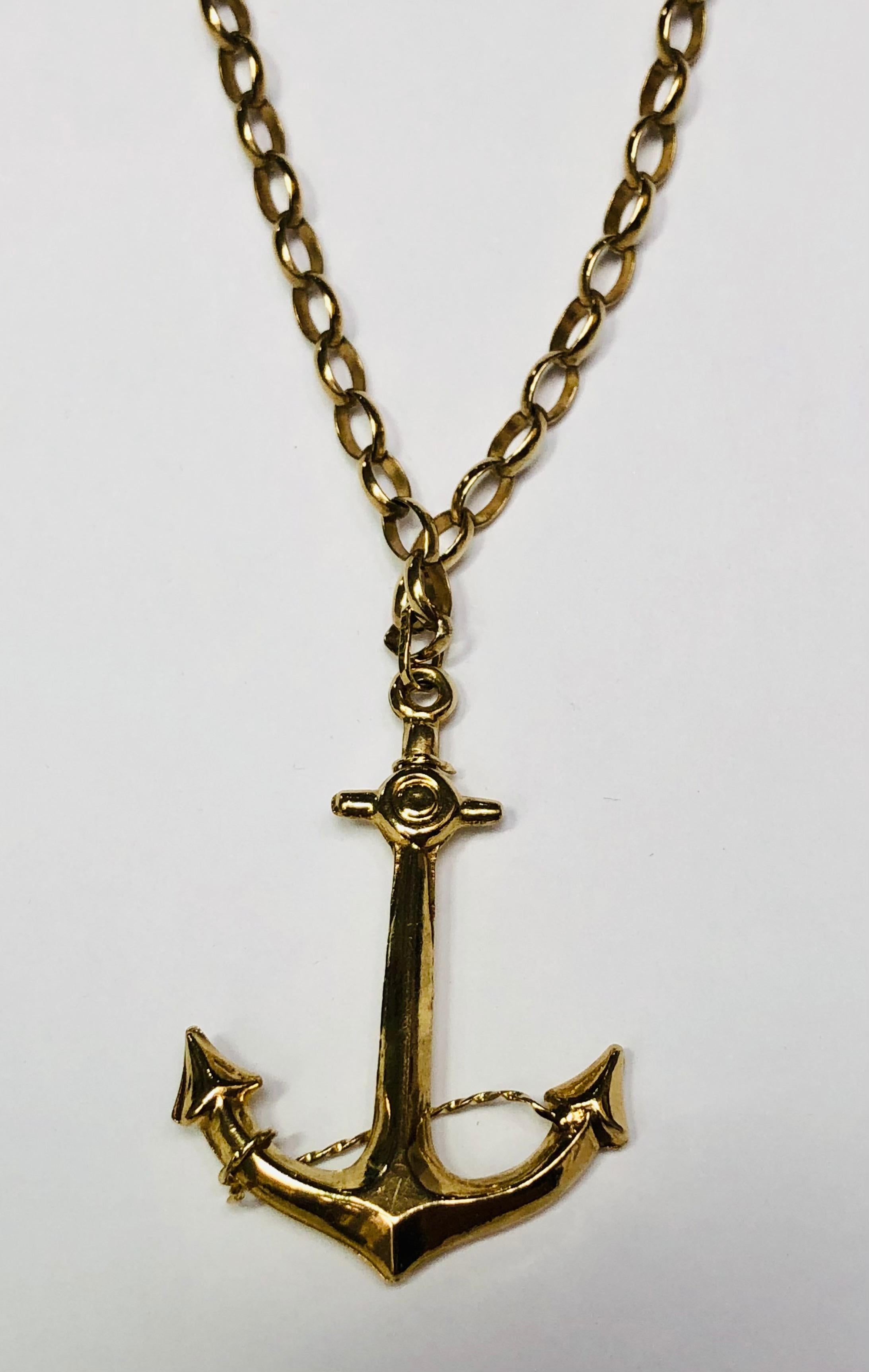 A vintage gold Anchor pendant and belcher chain stamped with the anchor mark for Birmingham, England. A lovely summer jewel for sailors or boating types. Marked 375 for 9 karat gold. This long line necklace is 65cms with pendant length 4.5cms by