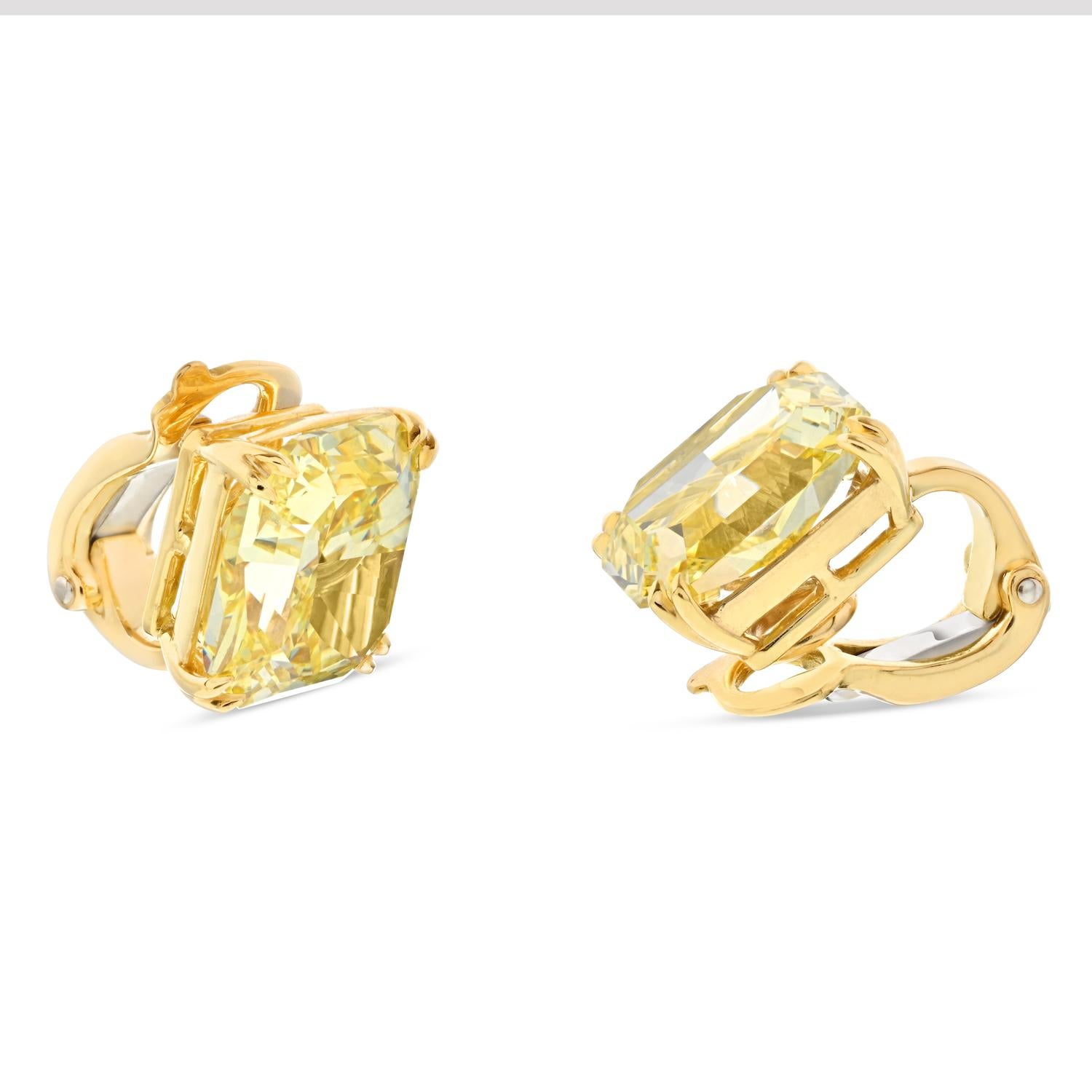 Modern Gold and 12.09ct Radiant Cut Fancy Intense Yellow Diamond Stud Earrings