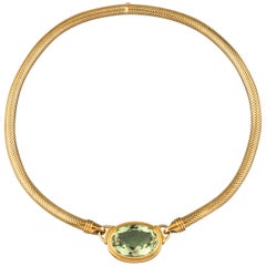 Collier vintage Gübelin en or et péridot 30 carats