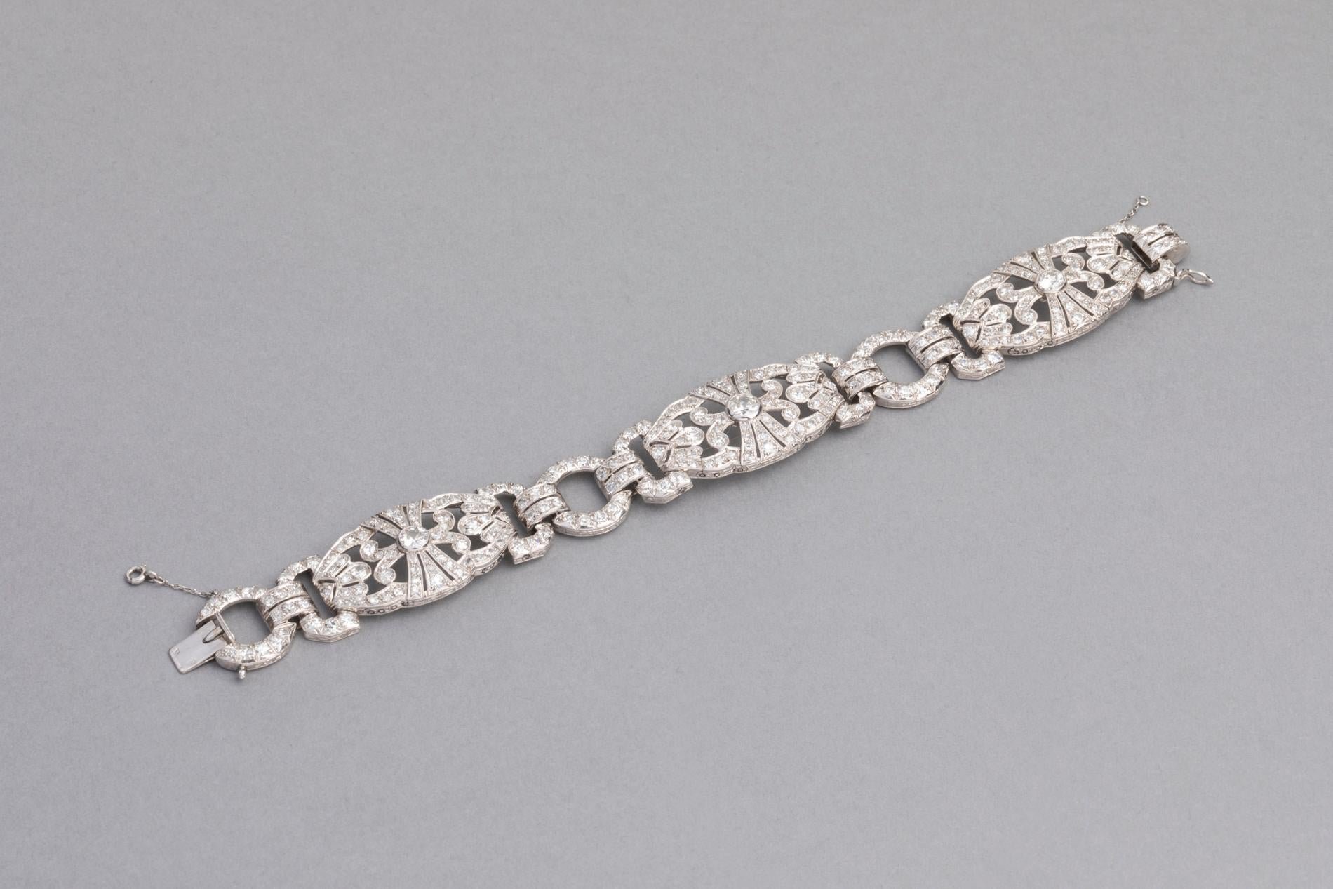 Very beautiful Art Deco Bracelet, made in France circa 1930.  
Mounted in white gold 18K and beautiful diamonds. 
French marks for gold 18k (old eagle) and mark of the maker/numbers.   
The weight off the diamonds is 9 carats estimate. The principal