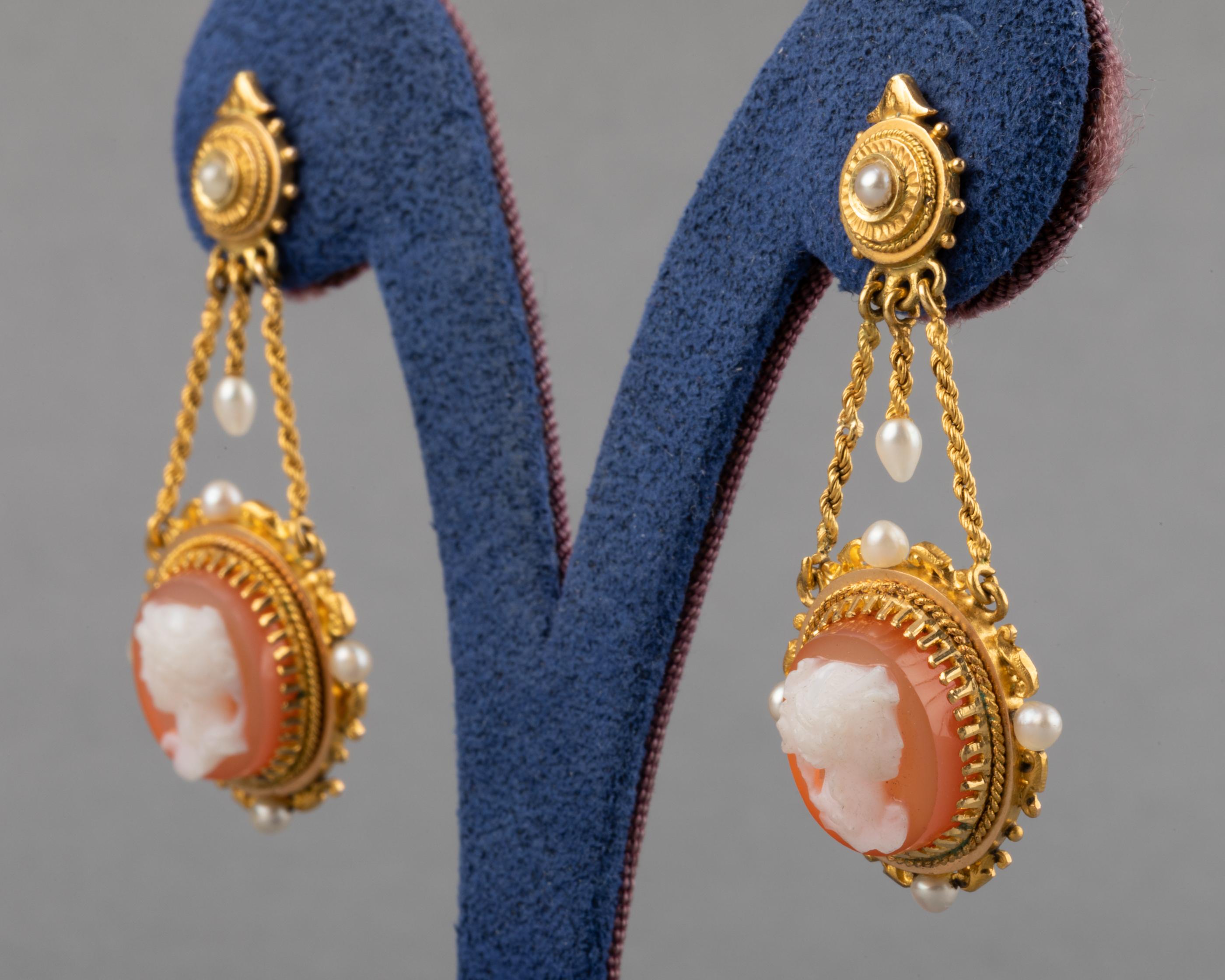 Gold and Agate Antique Napoleon III Earrings 

Very beautiful pair of antique earrings, made in France circa 1860.
Made in yellow gold 18k, two colors Agate Stone and pearls.
The cameos represent the profile of elegant Ladys.
Hallmark for gold 18k: