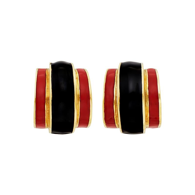 A Pair of Gold and Black and Red Enamel Half-Hoop Earclips mounted in 14 kt yellow gold. Made in the US, circa 1970
Weight: ap. 17.2 dwts. 
Measurements: 1 x 13/16 inch. 