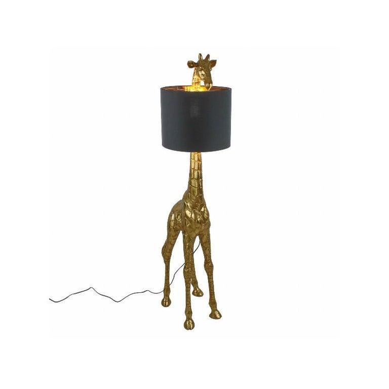 Gilded resin and black shade animal floor lamp.
