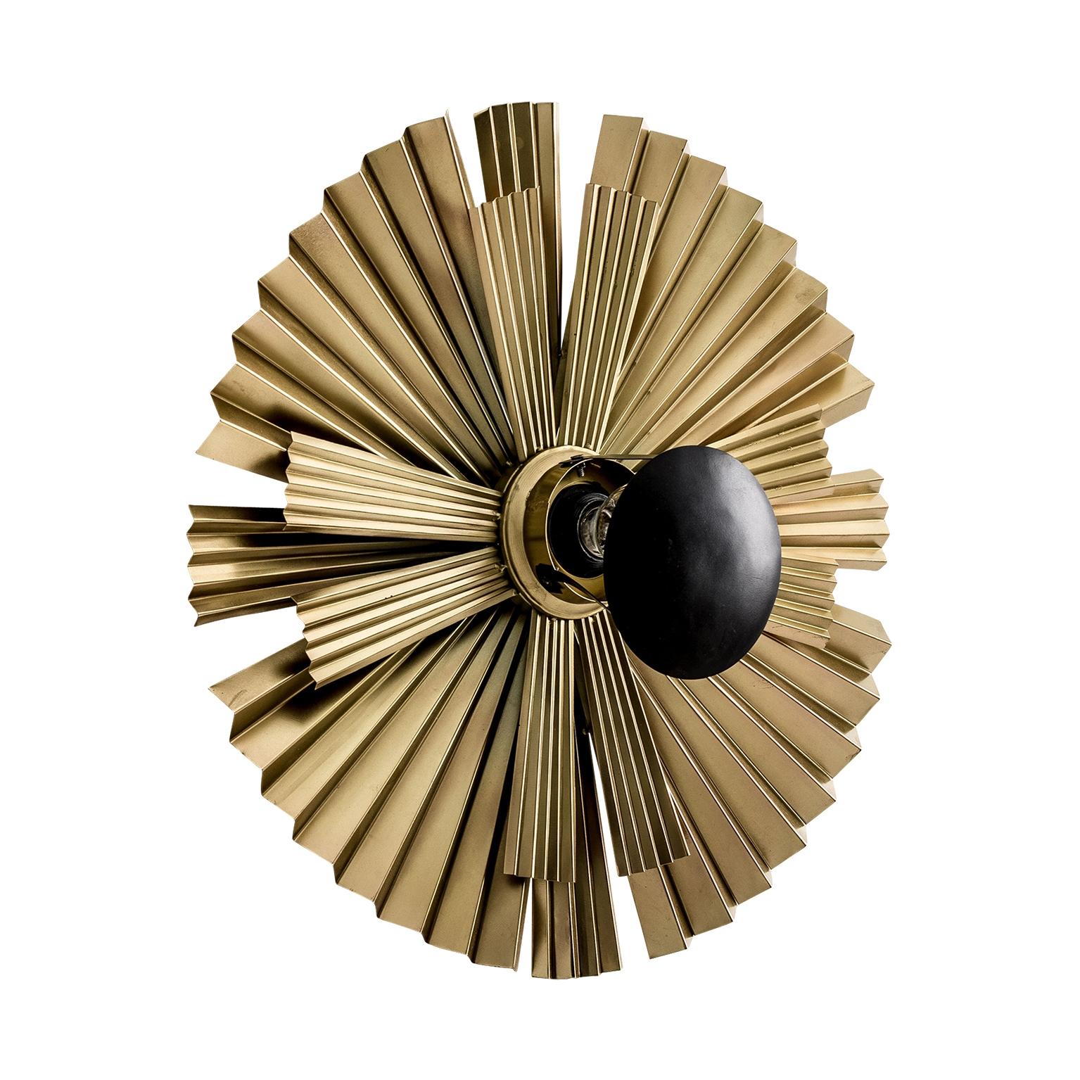 Gold and black lacquer finish metal wall lights composed of an aerial and round metal structure.