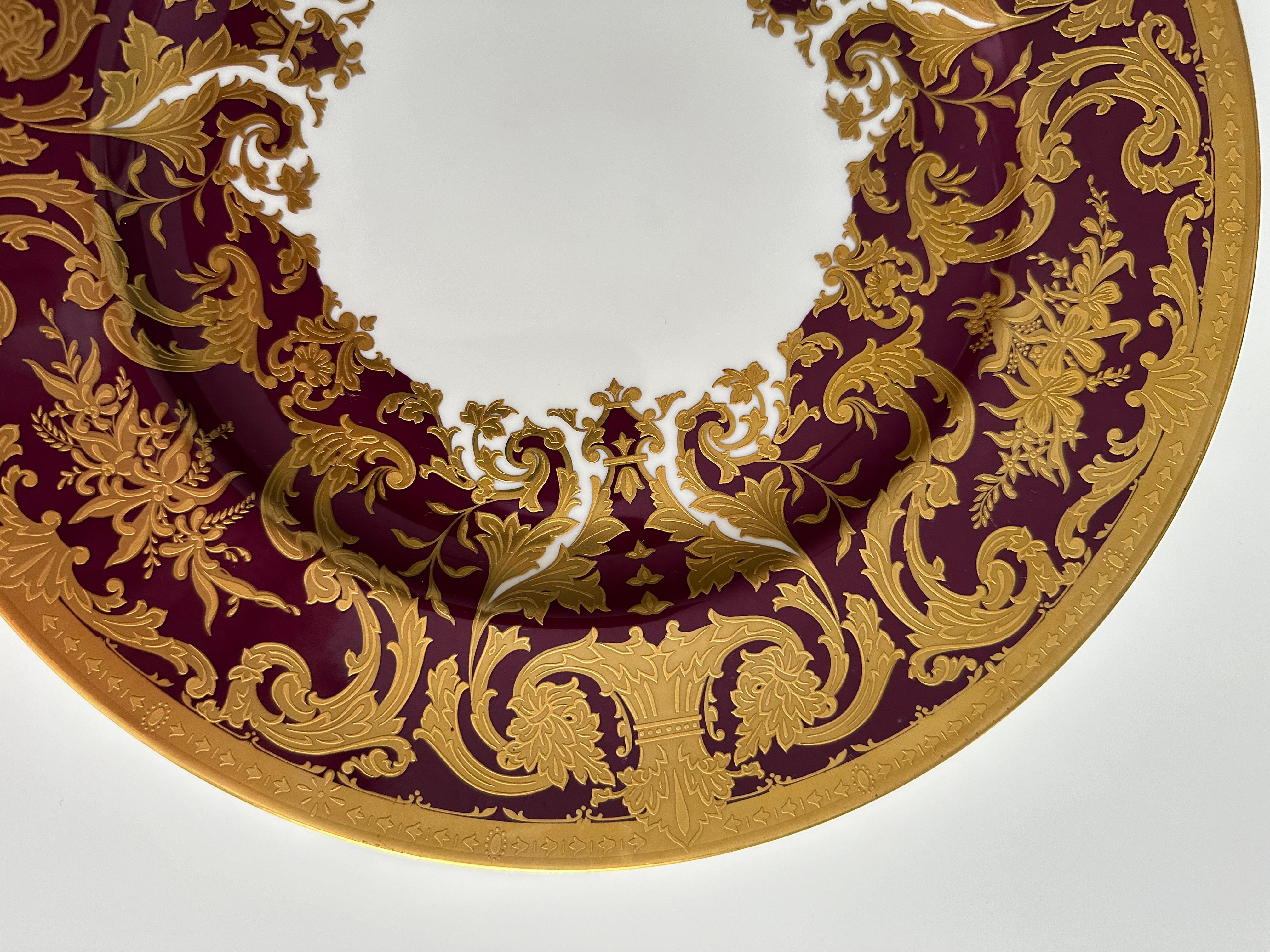 Gold and Burgundy Ornamental Decorative Plate in Barocco Style by De Lamerie
Fine bone china with hand engraving, 22K gold plated

Decorative plate, handmade in De Lameire factory, England as custom made order. Fine bone china. Model from the