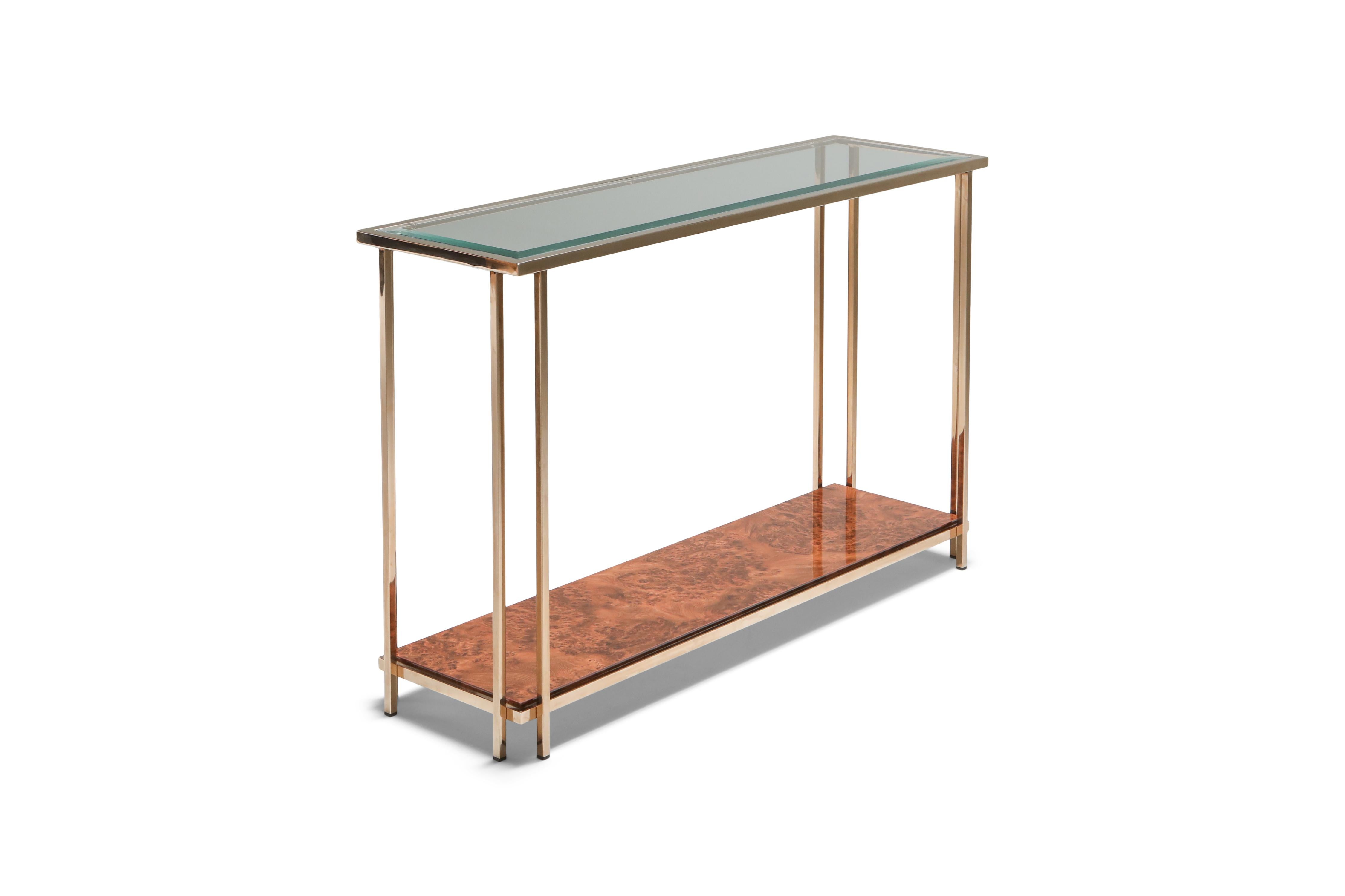 Maison Jansen, France, two-tier console table, 1980s
23-karat gold-plated frame.
Metropolitan chic piece, international style
Burl bottom, clear glass top.
Would fit well in an eclectic decor inspired by Hollywood regency.
    
  
