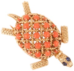 Gold and Coral Cartier Brooch