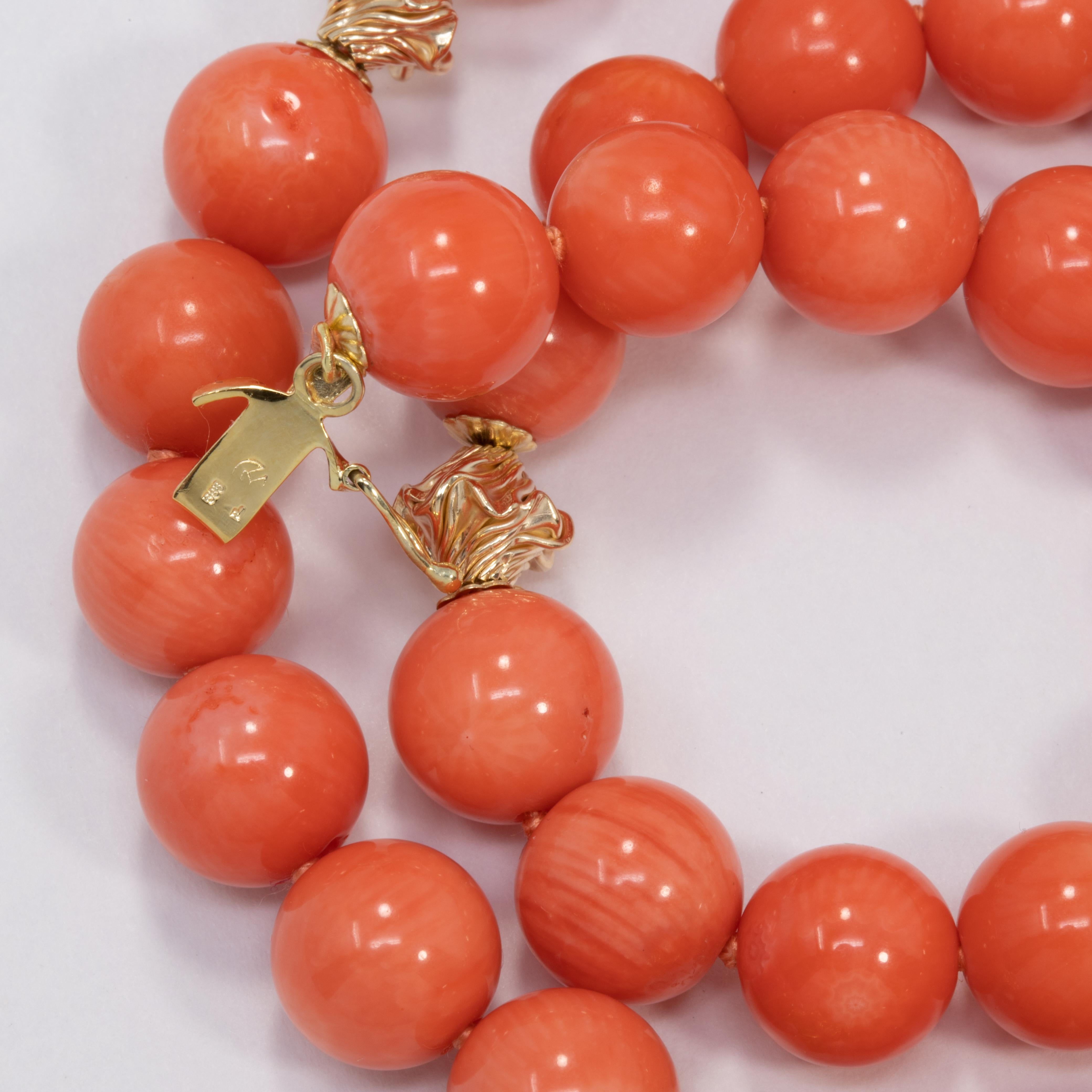 Retro Gold and Diamond Accented Salmon Coral Bead Knotted String Necklace, 14 Karat For Sale