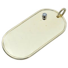Gold and Diamond Cartier Dog Tag