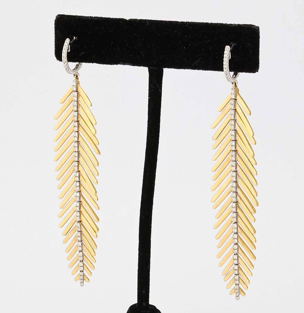 gold feather earings