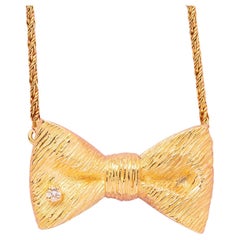 Gold and Diamond Fred Paris Bow Necklace