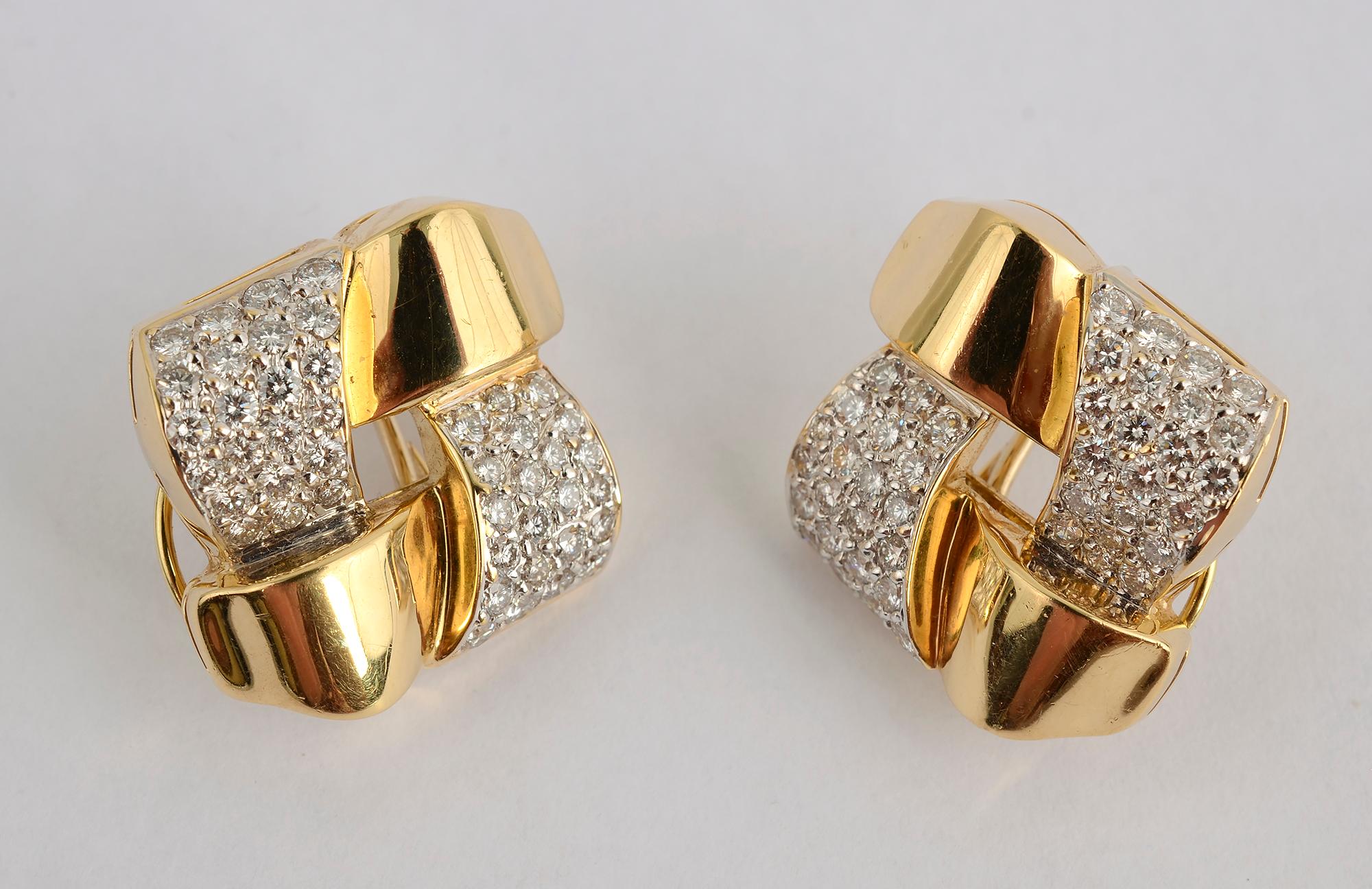 Elegant gold and diamond earrings woven in a lattice pattern.  All four arms are rounded in form to give the graceful appearance of fabric.
The earrings have 2.6 carats of diamonds that are VS quality; H color.
Backs are clips and posts.