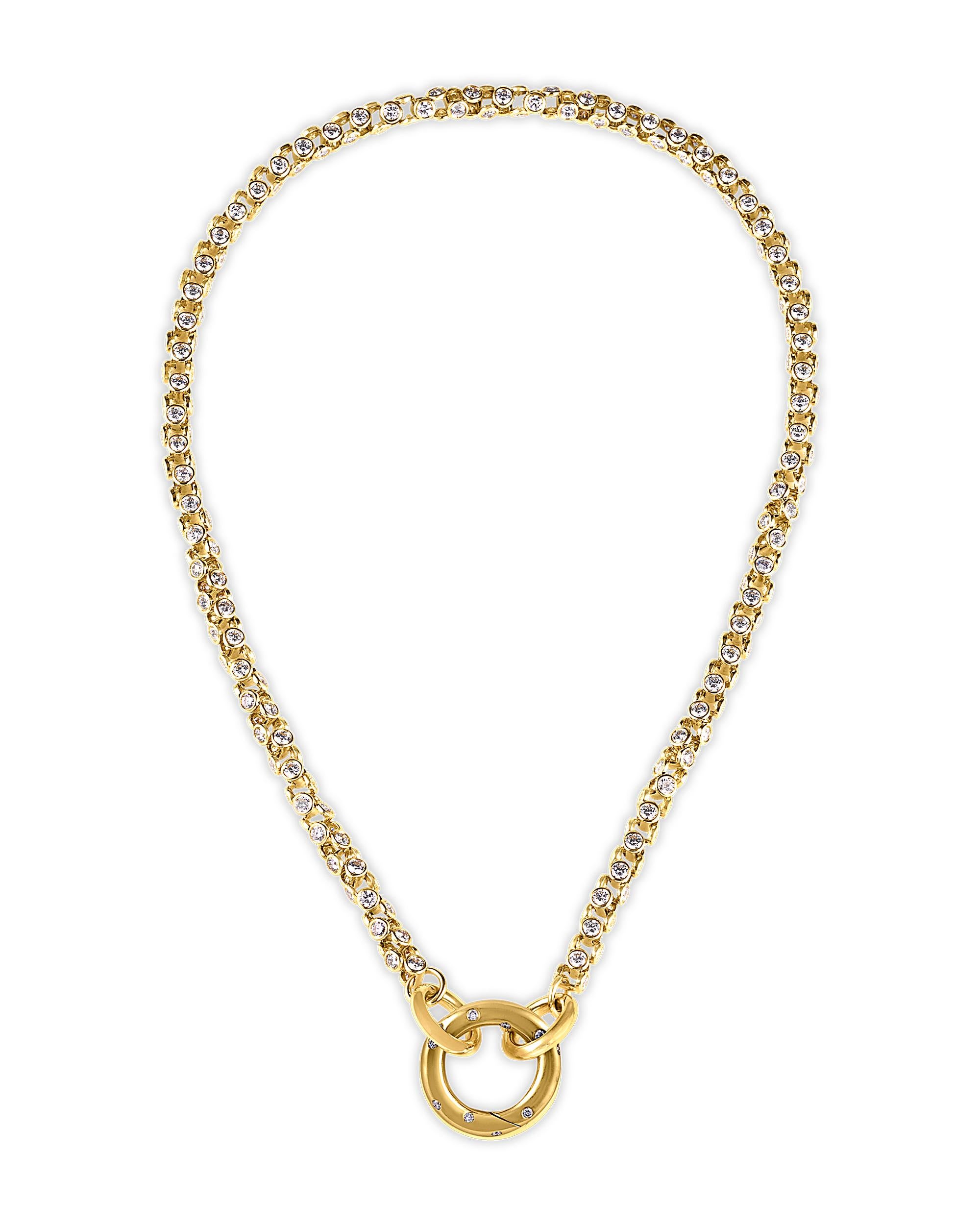 Bold 18K yellow gold links and 304 white diamonds totaling 15.99 carats comprise this classic chain necklace by Oscar Heyman. Each link is joined by a bezel set round diamond accent, adding sparkle to the modern design. Masterfully crafted, this