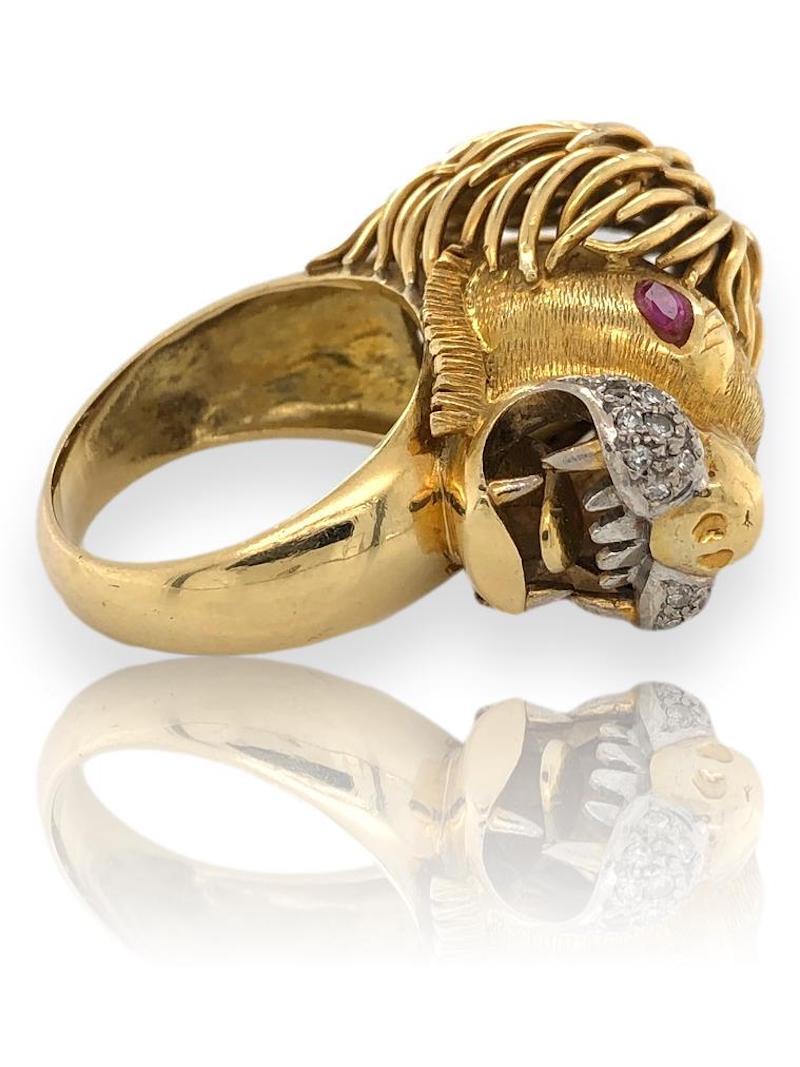 1970's Leo Zodiac ring. 18k Gold Lion head ring with ruby eyes and a diamond muzzle. The 1 1/8