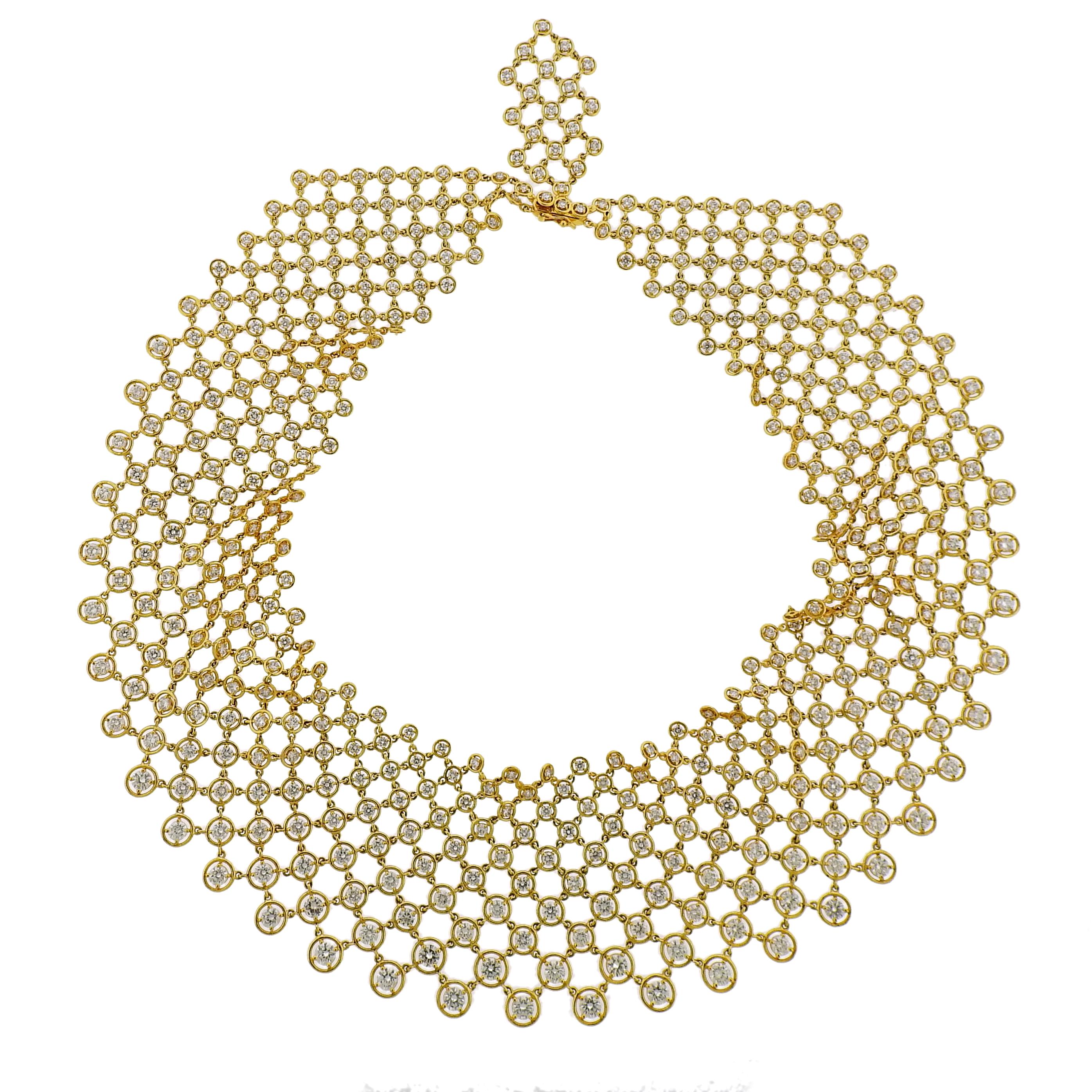 Gold and Diamond Mesh Bib Necklace
18 kt., round diamonds ap. 23.00 cts., with extra link attached, ap. 54.4 dwts/84.5 Gram Length 15 inches. 

Diamonds: G-H-I-VS. 

Well-made. Flexible. Width 1 7/81 to 1 1/2 inches. 

SKU#N-01672
