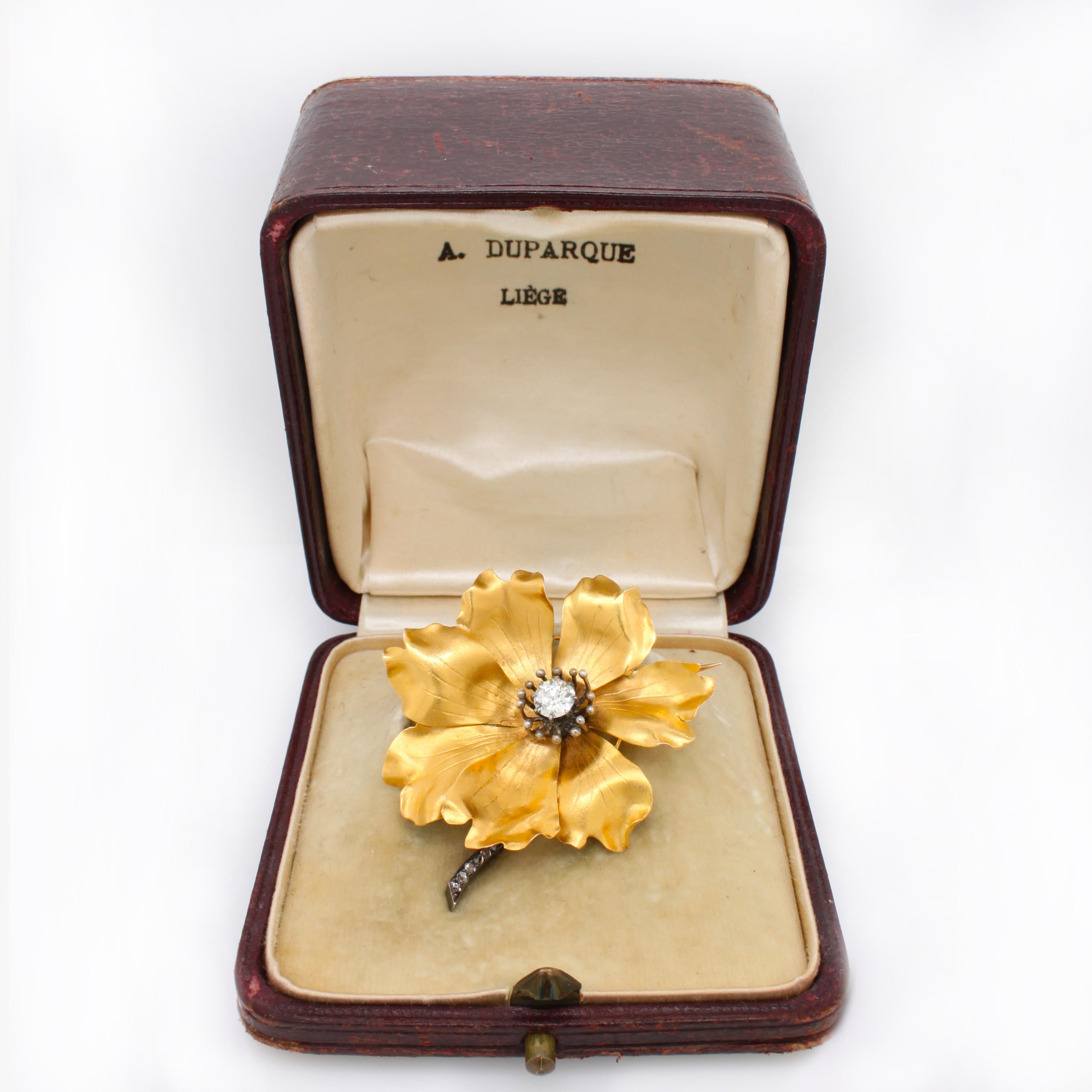 A French gold and diamond peony flower brooch with exceptional goldsmithing craftsmanship, ca. 1900.

The overall impression and feel of this brooch is absolute and real. All elements come together to showcase reality. Fine sheets of gold were used