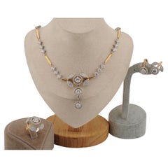 Parure en or et diamants - Collier, boucles d'oreilles et bague
