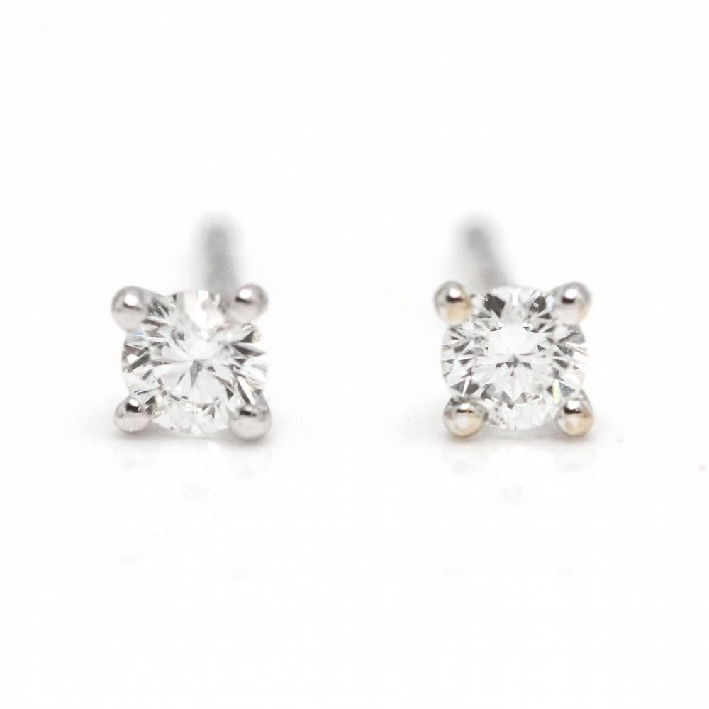 Women's Gold and Diamond Earrings  2x Brilliant Cut Diamonds with a total weight of 0.30ct in G/VS quality  18kt White Gold  0.93 grams.  Sizes: Width 4mm  Brand new item only available on the web  Ref.:D363094CG