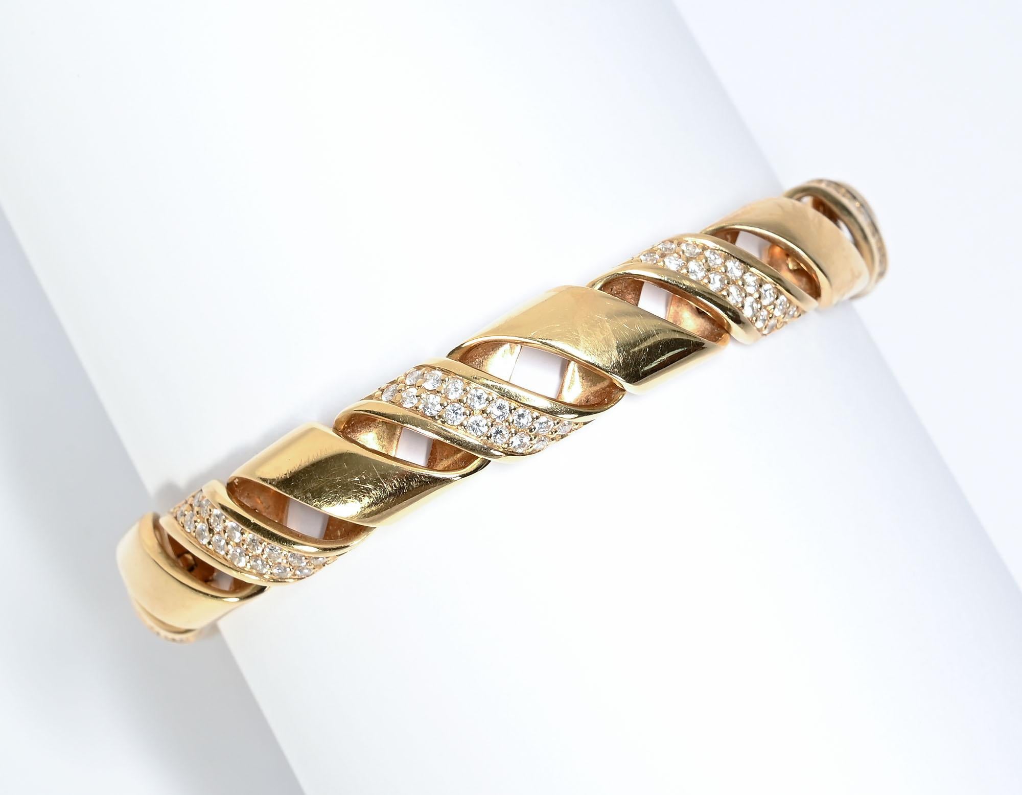 Beautifully made 18 karat gold bracelet of diagonal links alternating with the same shape with diamonds. The fabrication of the bracelet makes it flexible and very comfortable to wear. It has 144 diamonds with a total weight of 3 carats. The