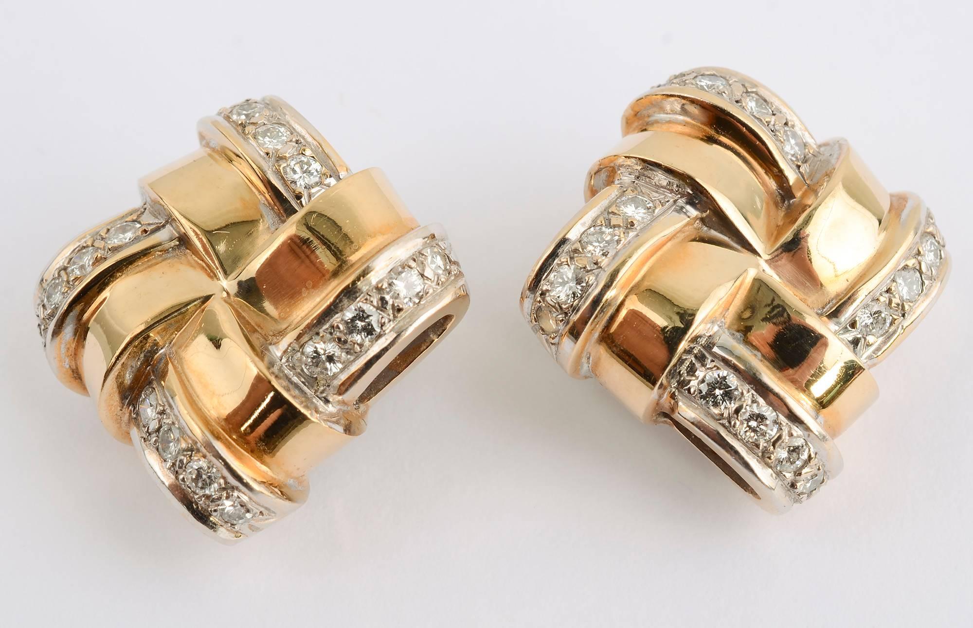 Bands of polished gold alternate with bands of diamonds in these interesting lattice pattern earrings. The woven aspect is especially visible from the side where one sees the graceful curve of the bands that are 1/4 inch in height. The earrings are