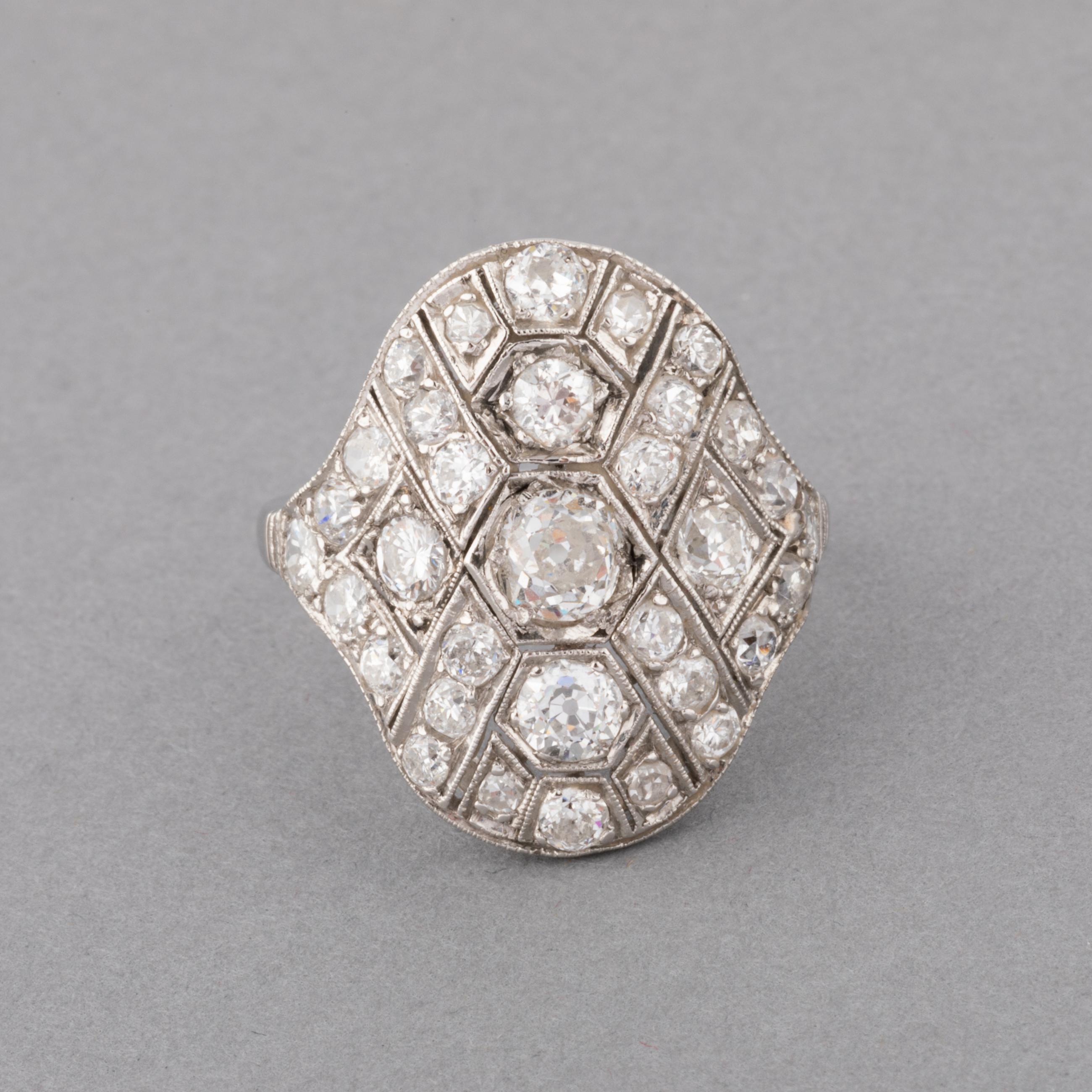 One beautiful ring, made in France circa 1930. Made in white gold 18k.
The diamonds are Old European cut and transitional cut, 2 carts total approximately. They are mostly white color and clear.
Dimension of front: 23 and 20mm.
Ring size: 57 or 8