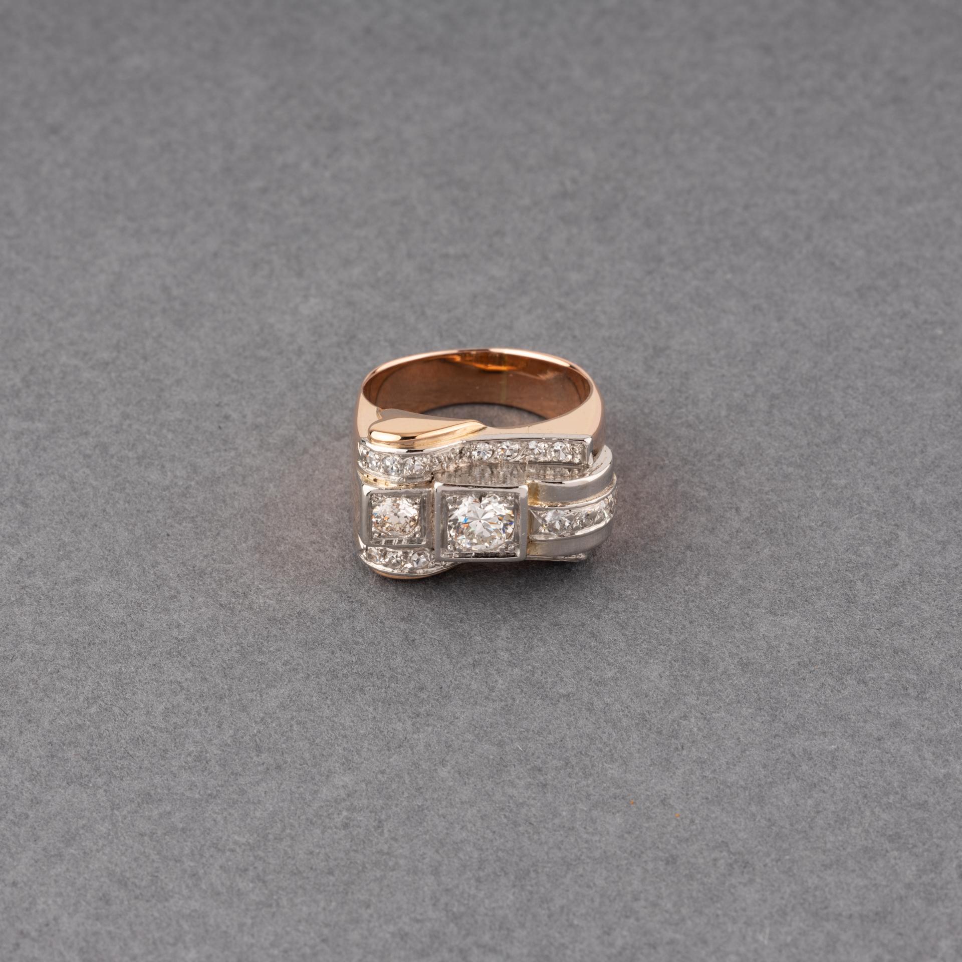 A very lovely ring, made in France circa 1940.
Made in white gold and platinum, hallmarked.
The diamonds are good quality, the bigger one weights approximately 0.60 carats. 1.20 carat total.
Dimension of front part: 22*14mm
Ring size: 55 or 7