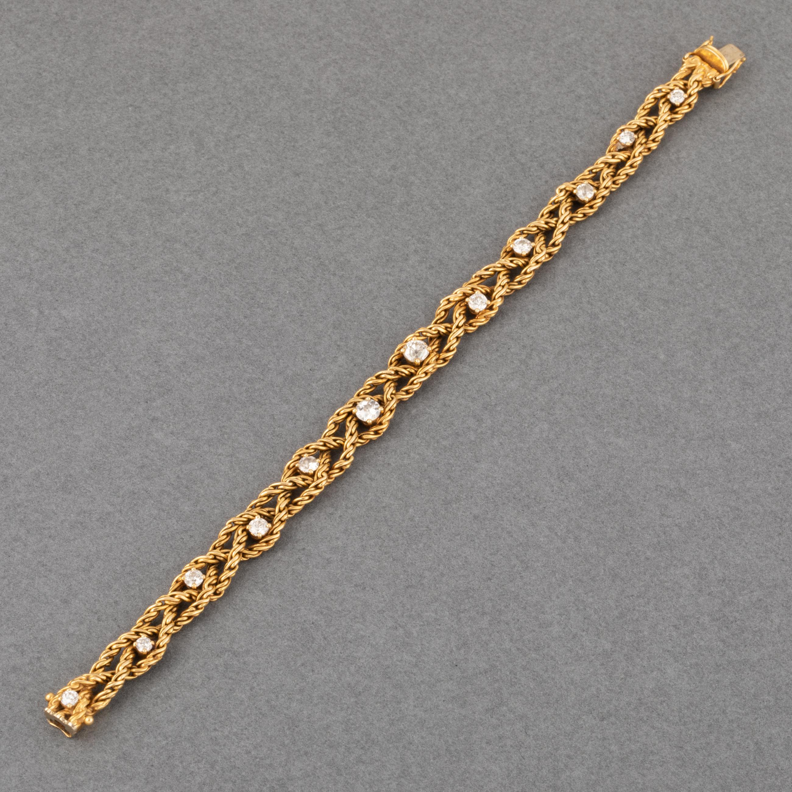 One very lovely vintage bracelet, made in France circa 1950.
Made in yellow gold 18k and set with 1.20 carats of diamonds.
The length is 18cm, the width is 8mm.
Signed Chaumet with numbers.
Weight is 23.60 grams.