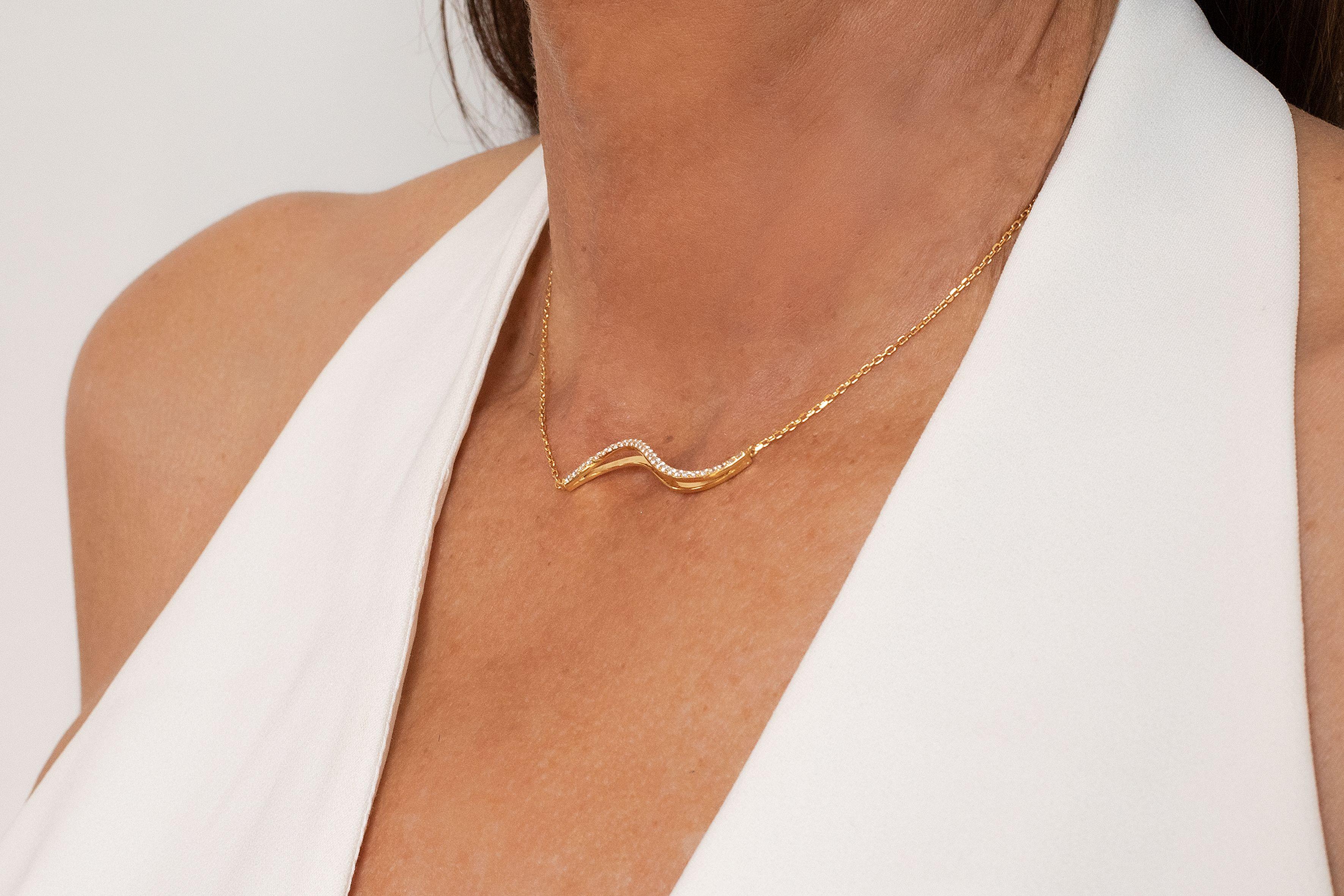 The Waves jewelry collection is an expression of elegance and beauty inspired by the smooth curves and molding of the sea, the waves that dance and move with grace. Each piece is meticulously crafted to capture the fluid, captivating essence of the