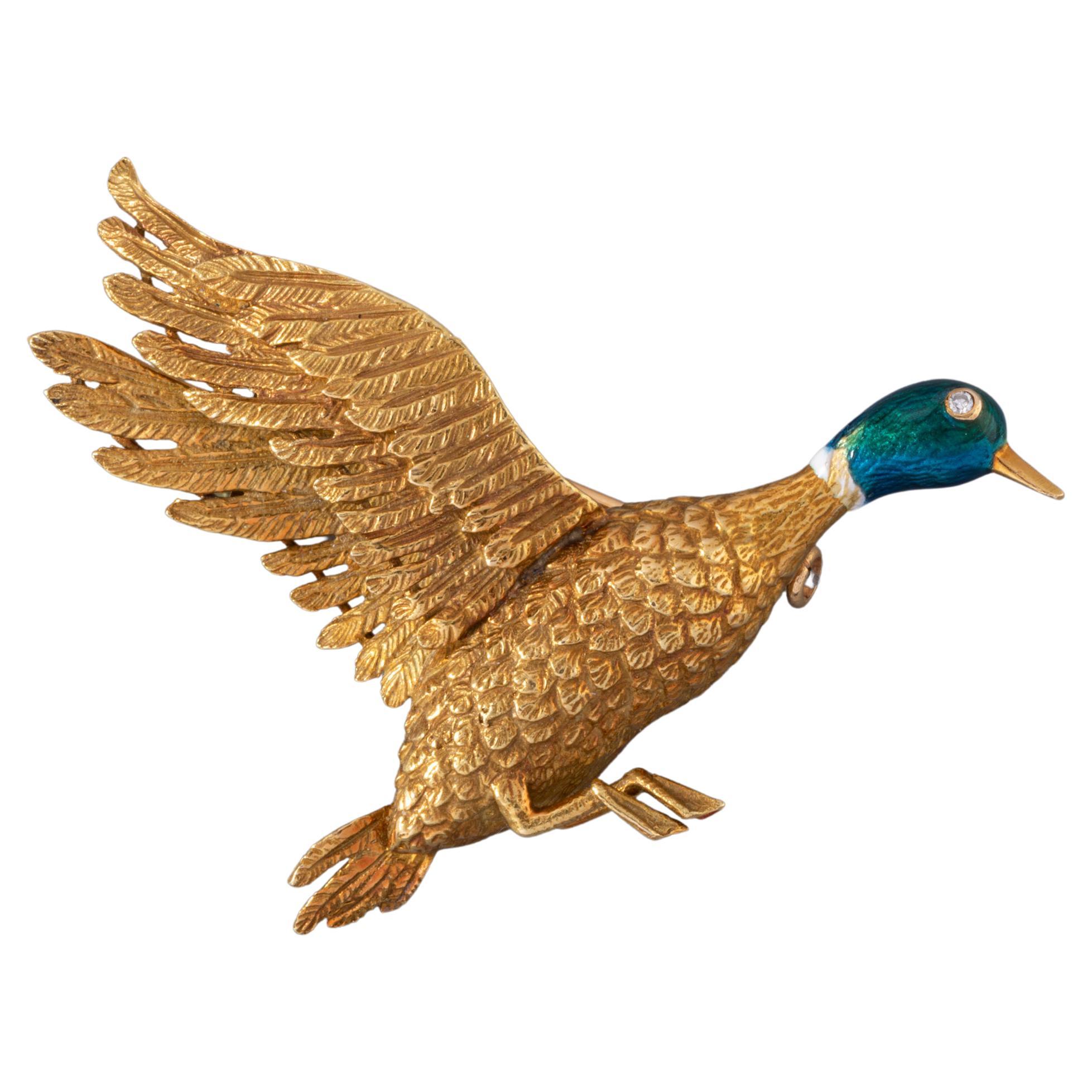 Gold and Enamel Mellerio Bird Brooch