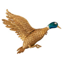 Gold and Enamel Mellerio Bird Brooch