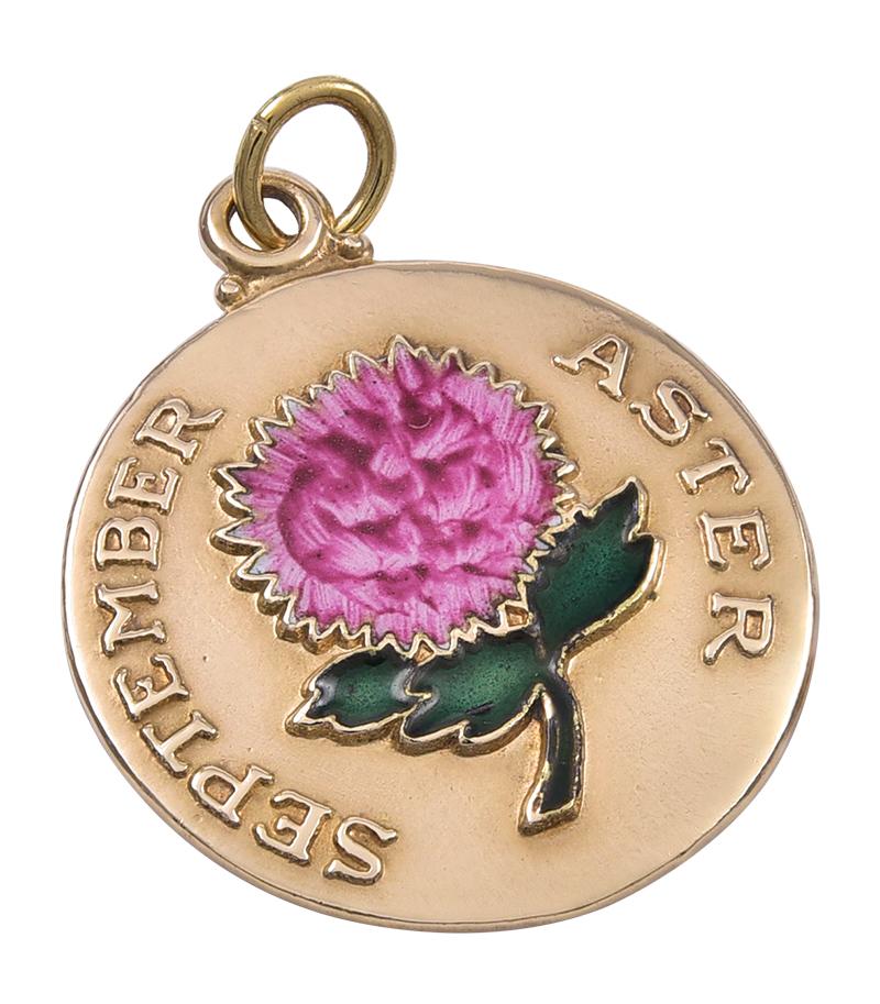 Lovely charm for a September baby:  a round disc with an applied enamel flower in the center.  Applied letters spell out 