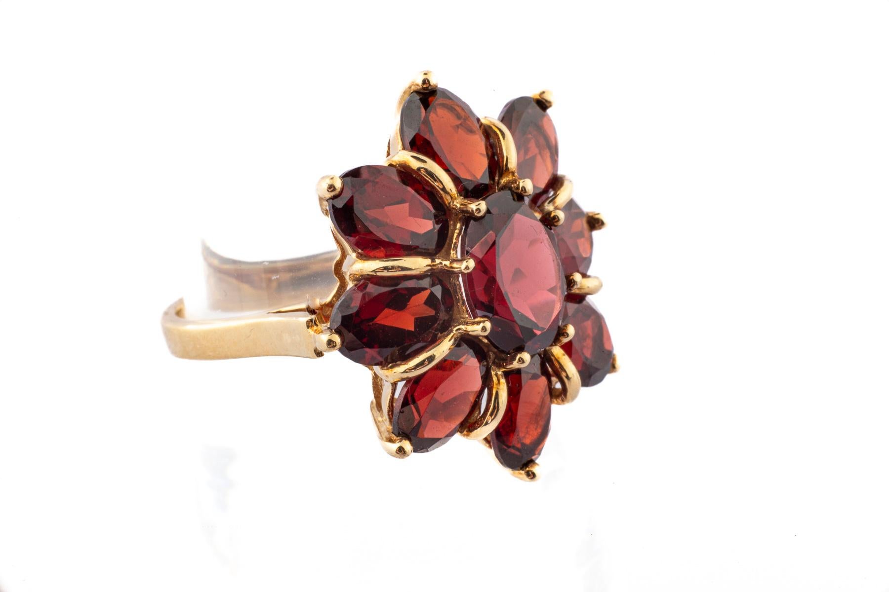 Oval Cut Gold and Garnet Mid Century Flower Ring For Sale