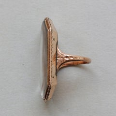 Gold Mourning Ring with the Initials JW Over Braided Hair