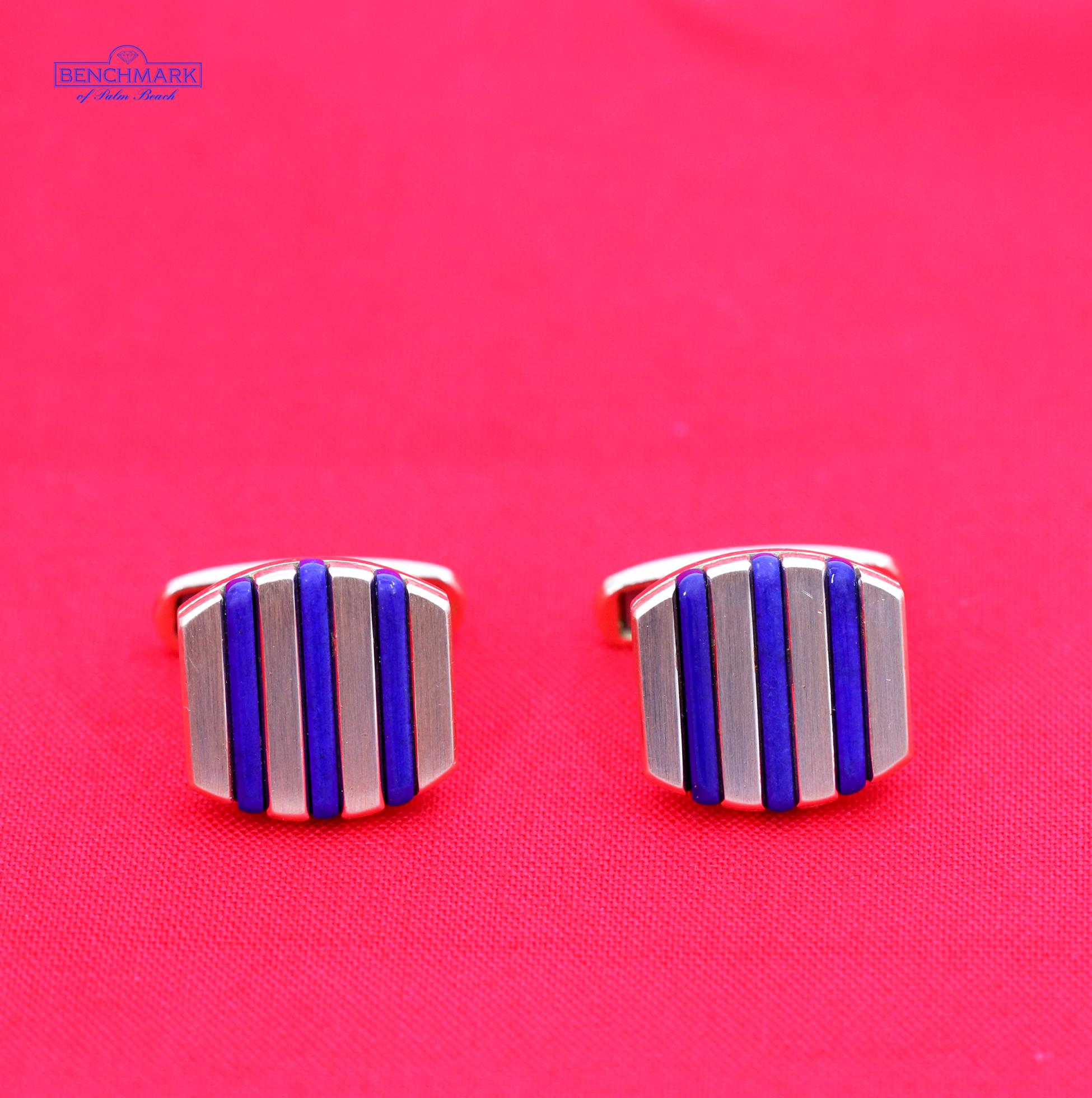 A pair of 18 karat yellow gold, cushion shaped, cufflinks, with each cufflink set with 3 lapis lazuli bars. The deep blue contrasts handsomely against the gold, and they measure just under 3/4 of an inch long. Signed A.B.L. they weigh an overall 20