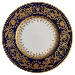 Plato decorativo dorado y azul marino en estilo barroco de De Lamerie