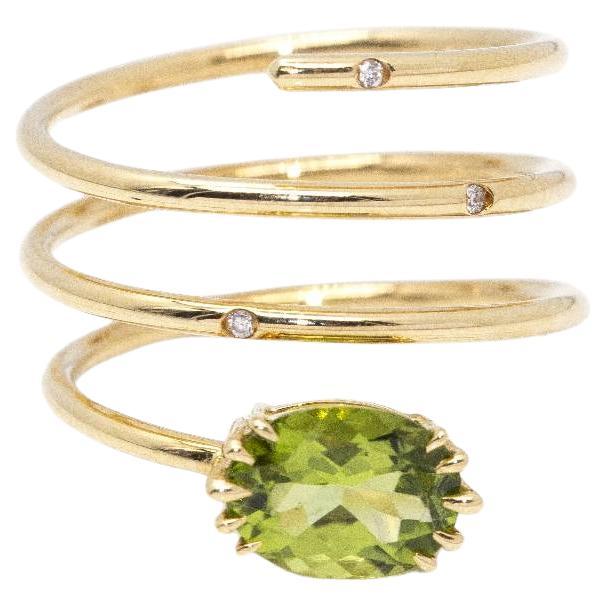 Gold and Peridot Spiral Ring For Sale