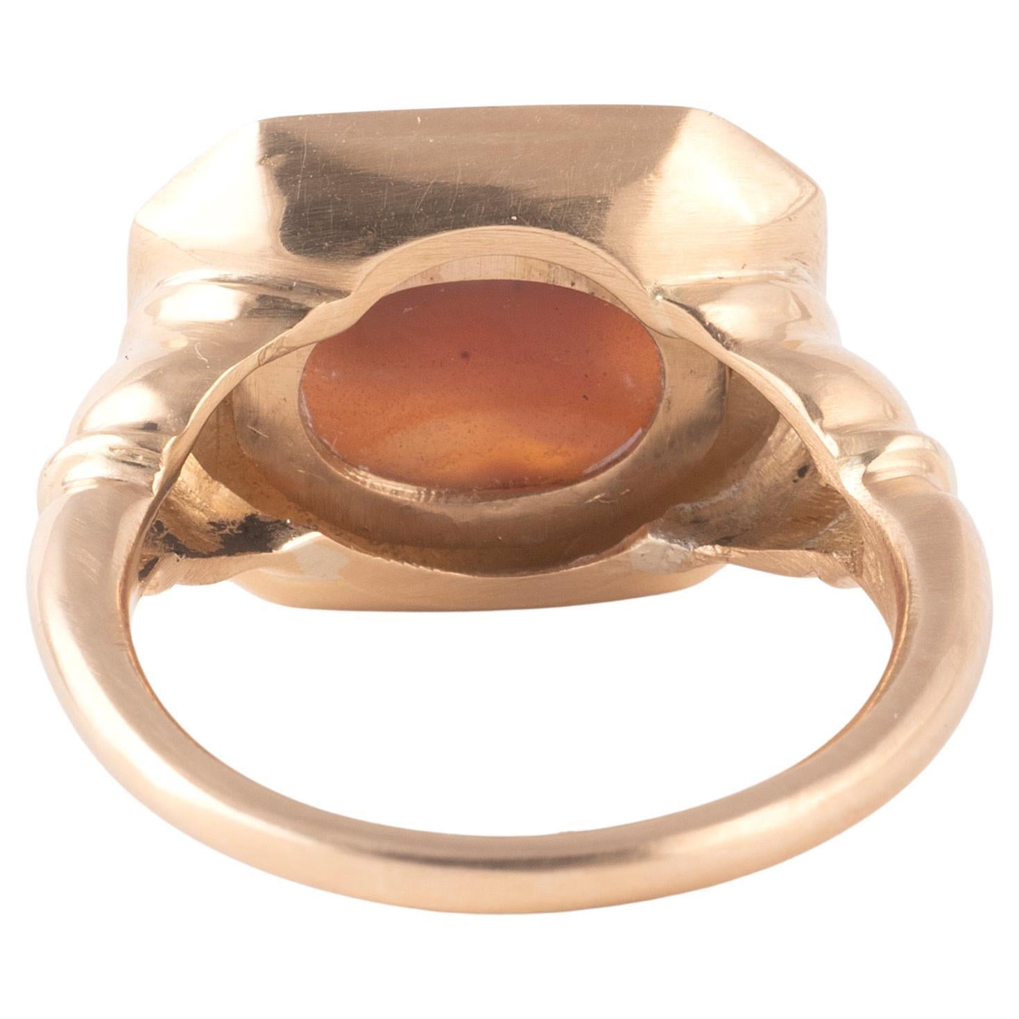 Roman, Imperial period, ca. 2nd to 3rd century CE. A wonderful gold ring mounted with an ovoid agate cameo of a dog. The cute canine sits with his body facing left. Man’s — and woman’s — best friend today was also the best friend of the Romans, even