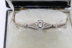 Gold and platinum bracelet with old cut diamonds, circa 1920.